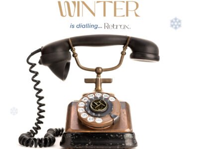 Old copper telephone with bakelite handset isolated on white background. 30s telephone